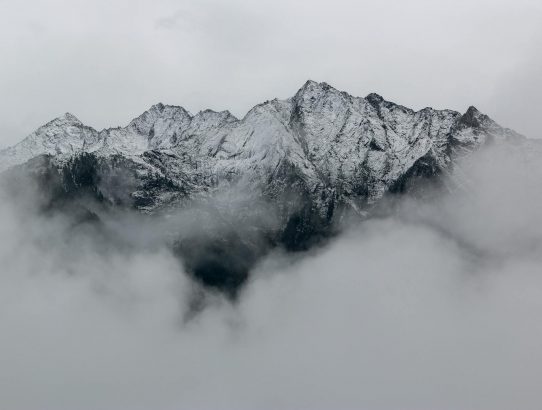 landscape photography of mountains covered in snow